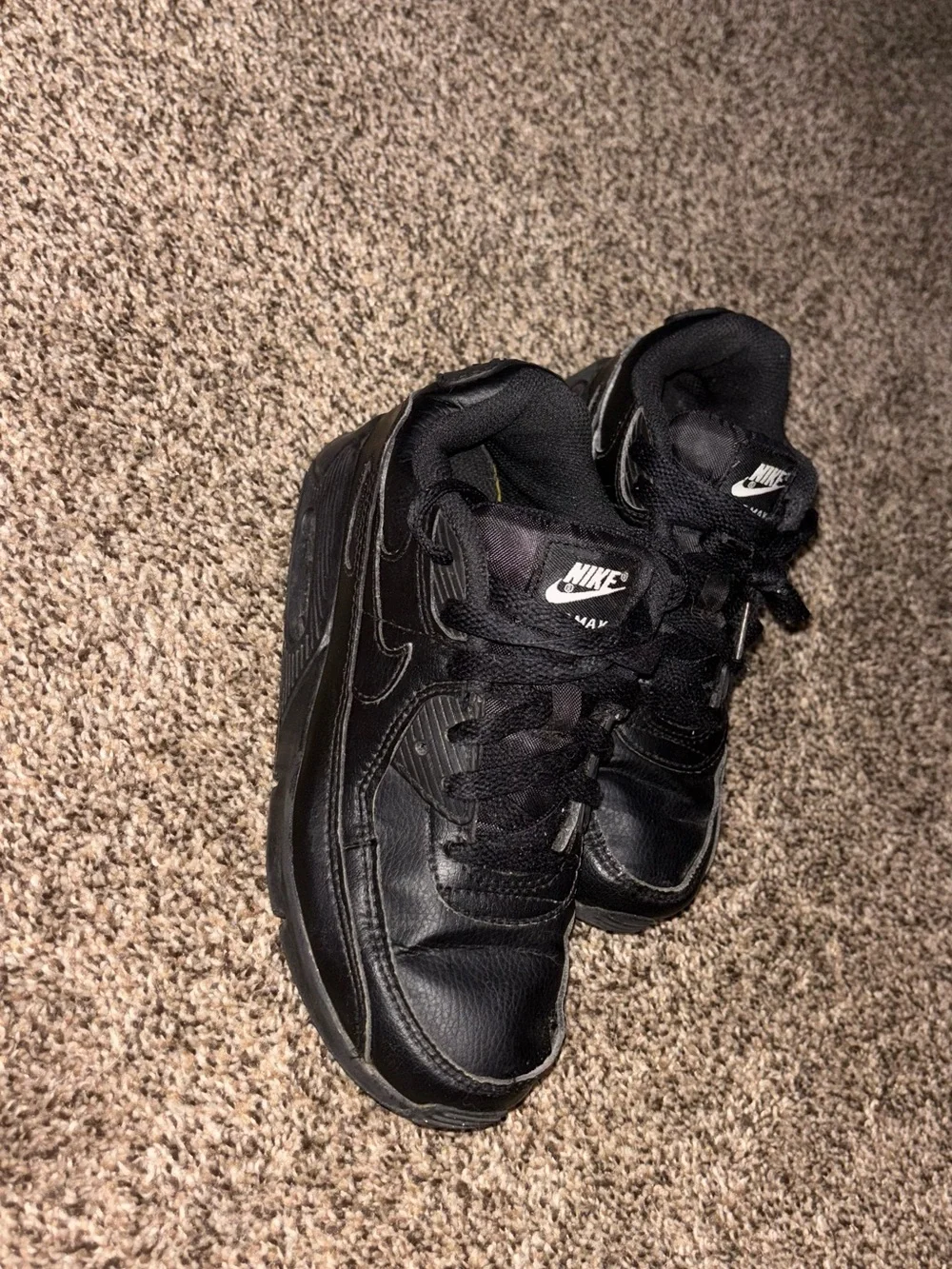 Nike Kids Black Low-Top Sneaker with Subtle Swoosh